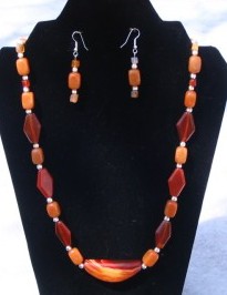 Adrienne has designed this brazilian banded agate with carnelian accent beads and bali siliver beads make a wonderful gift for any lady. It will be shown at the Riverton Rendezvous at the Park this summer on July 14 in Wyoming.